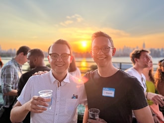 Jacques & Simeon having drinks on a rooftop
